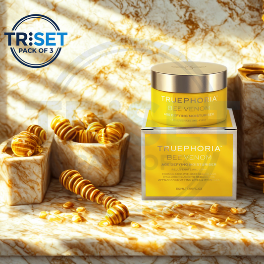 TRUEPHORIA Bee Venom product packaging on a marble surface with TRiSET branding.